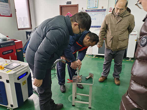 Customer Visits SUNTOP Facility for Laser Welding Machine Demonstration and Hands-On Experience