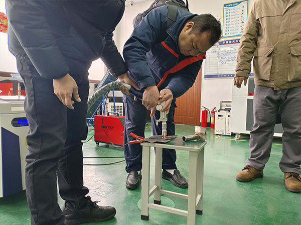 Customer Visits SUNTOP Facility for Laser Welding Machine Demonstration and Hands-On Experience